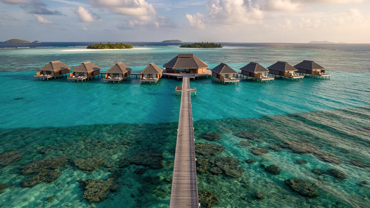 Overwater villa on a turquoise Maldives lagoon