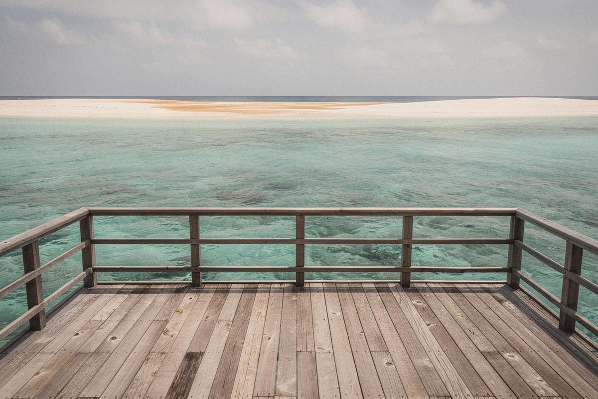 Overwater villa deck with turquoise lagoon, Maldives